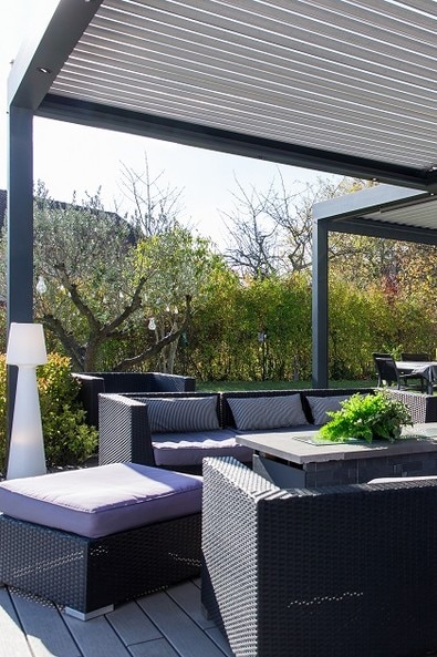 Outdoor furniture underneath pergola